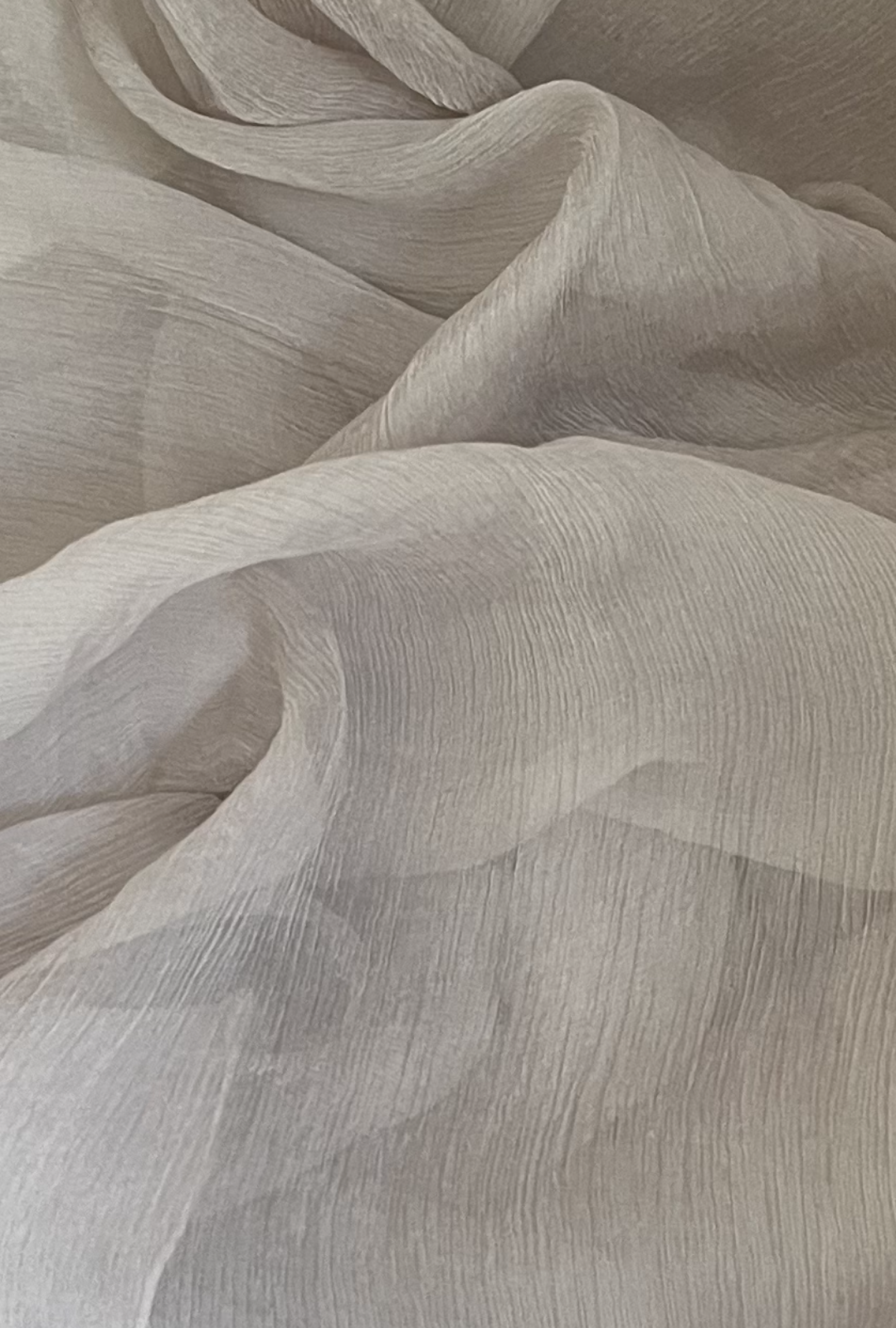 Étole beige plissée